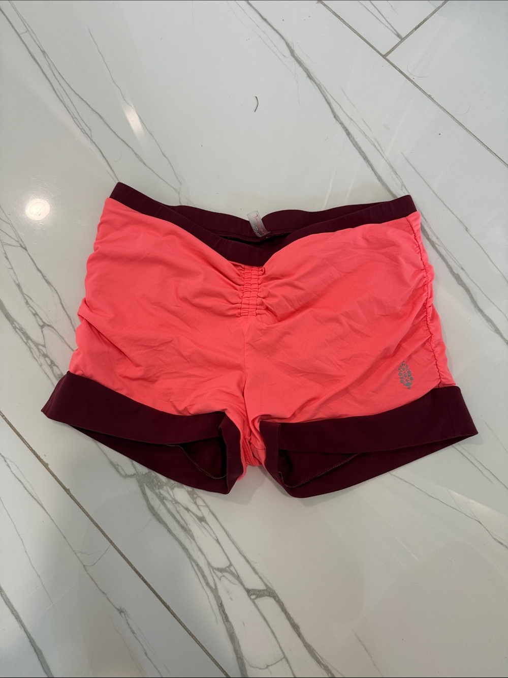 FP Movement by Free People Coral Pink Shorts with Maroon Trim